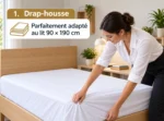 Femme installant un drap-housse blanc sur un lit une place de 90 × 190 cm